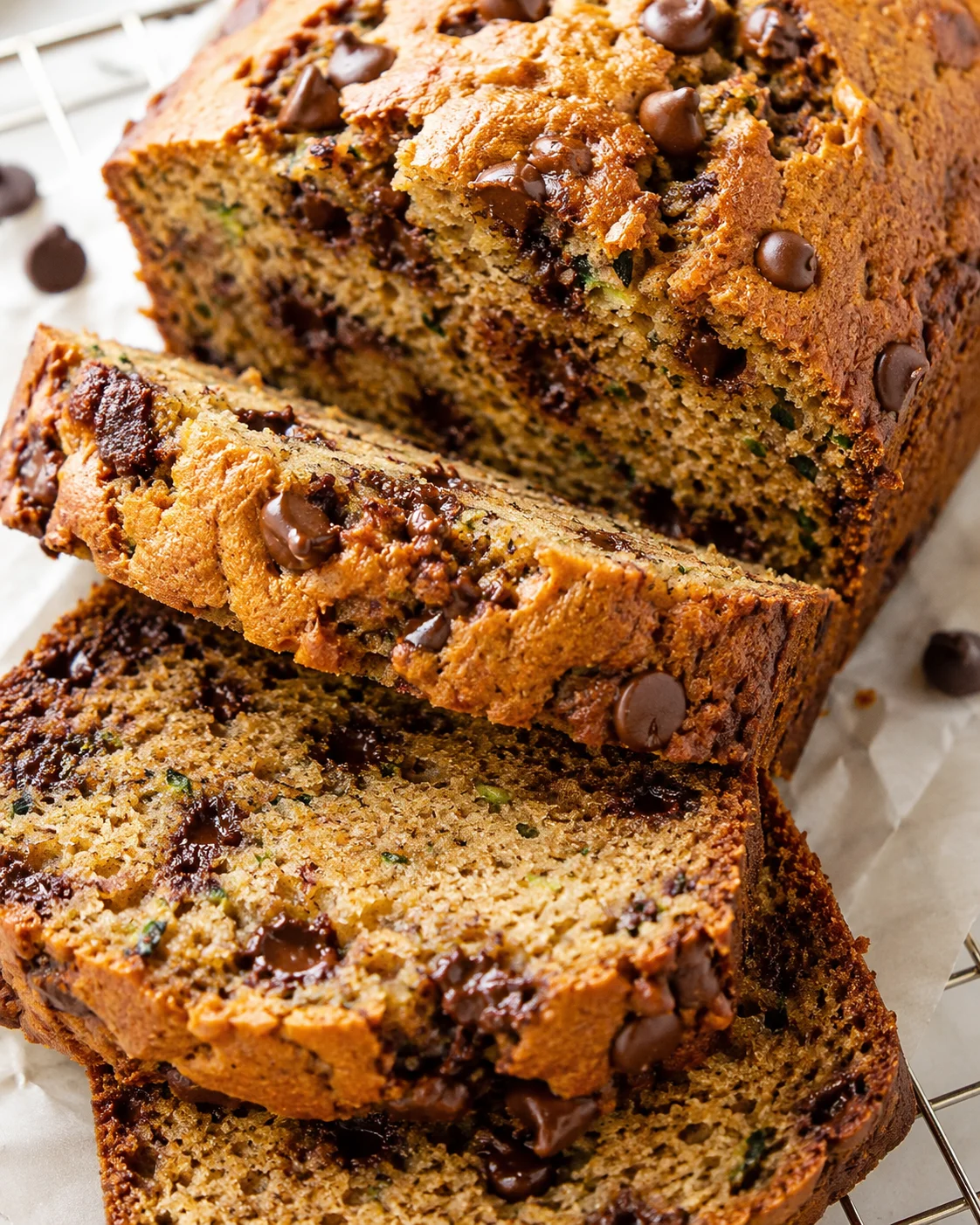 Delicious peanut butter zucchini bread with chocolate chips, sliced for serving.