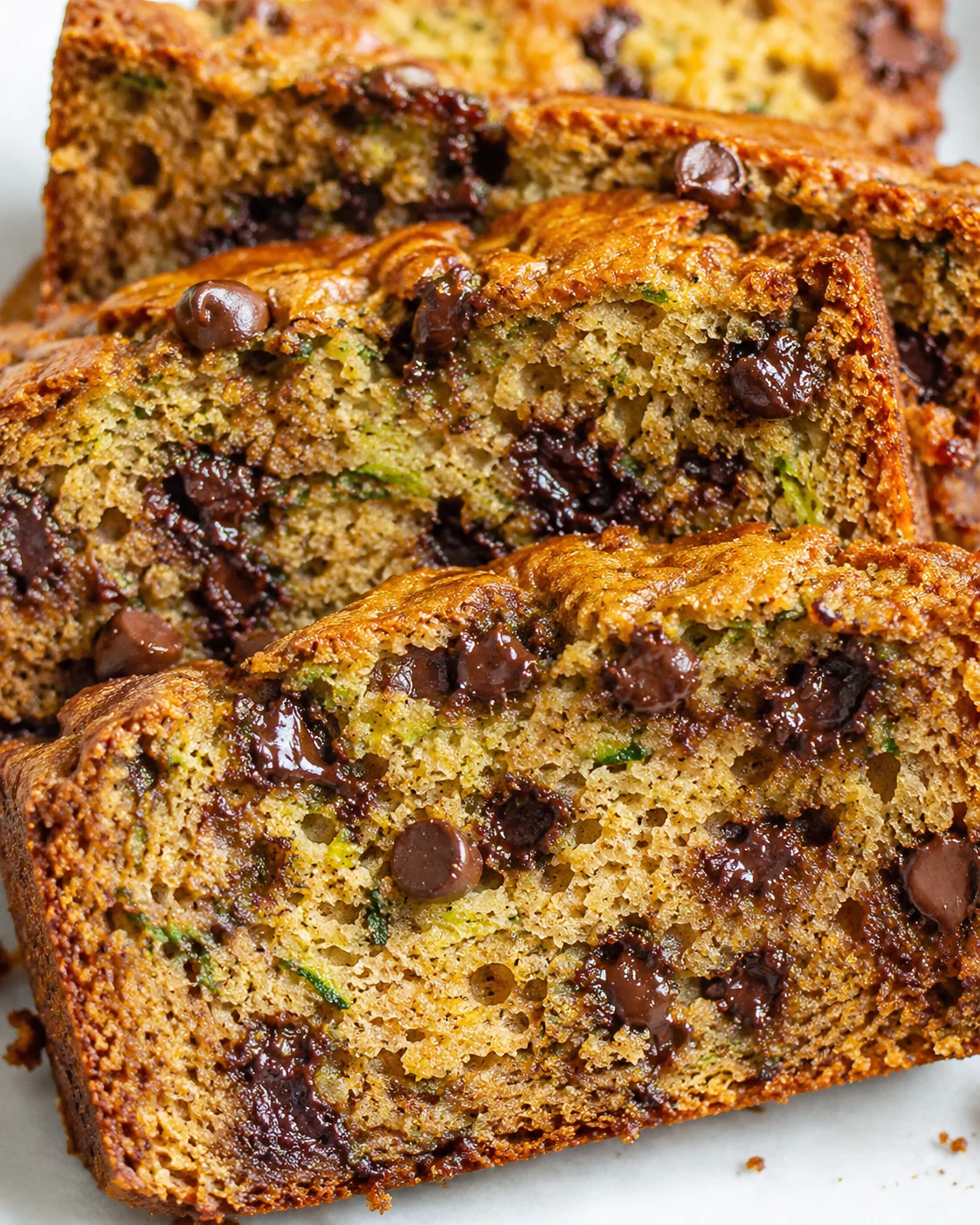 Chocolate Chip Zucchini Bread Close-up of moist zucchini bread loaded with chocolate chips slices.
